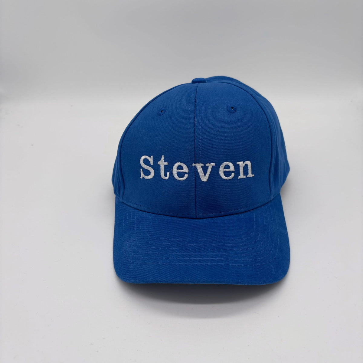 Pet met naam geborduurd in gekozen lettertype en borduurkleur