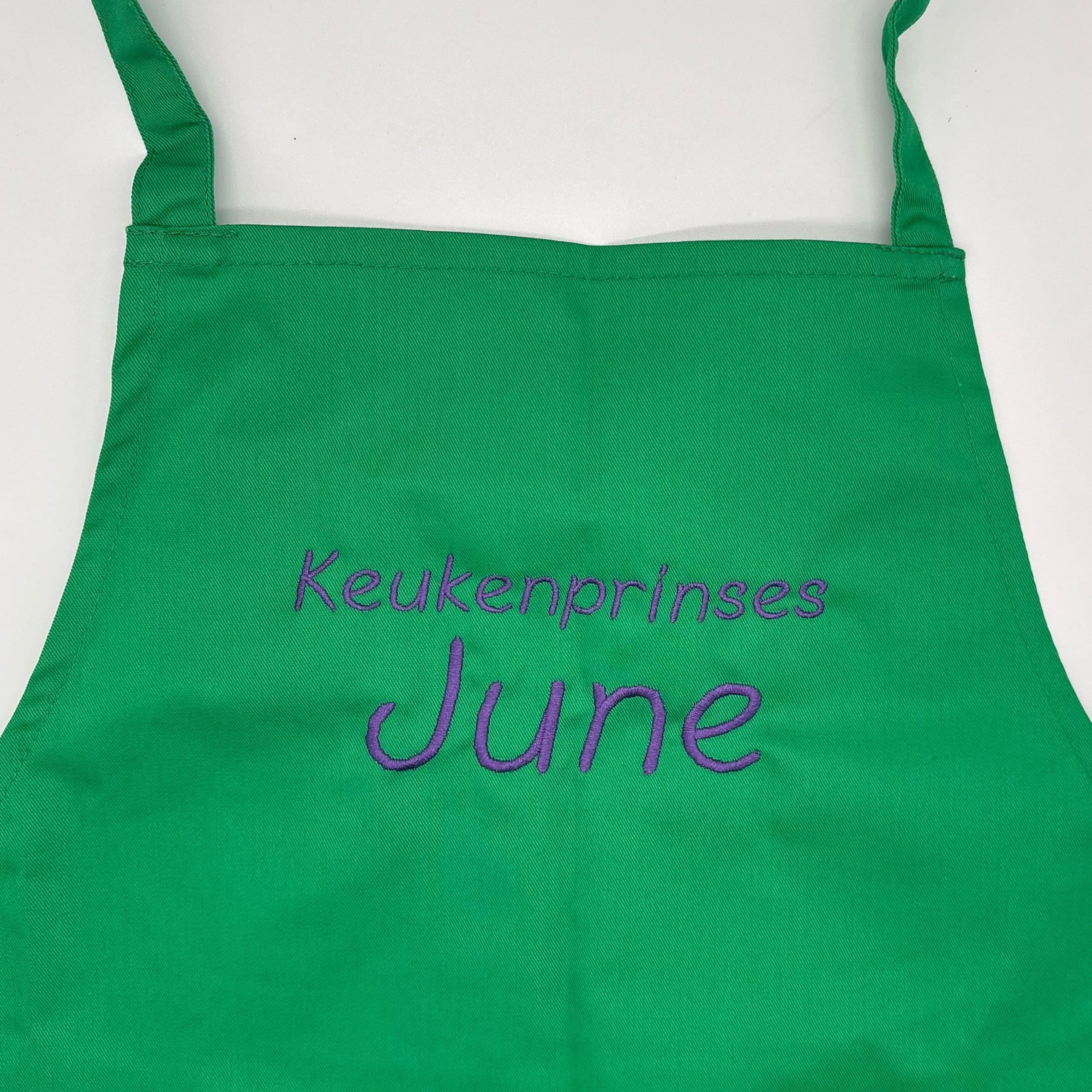 Keukenschort kind met naam – vrolijk gepersonaliseerd