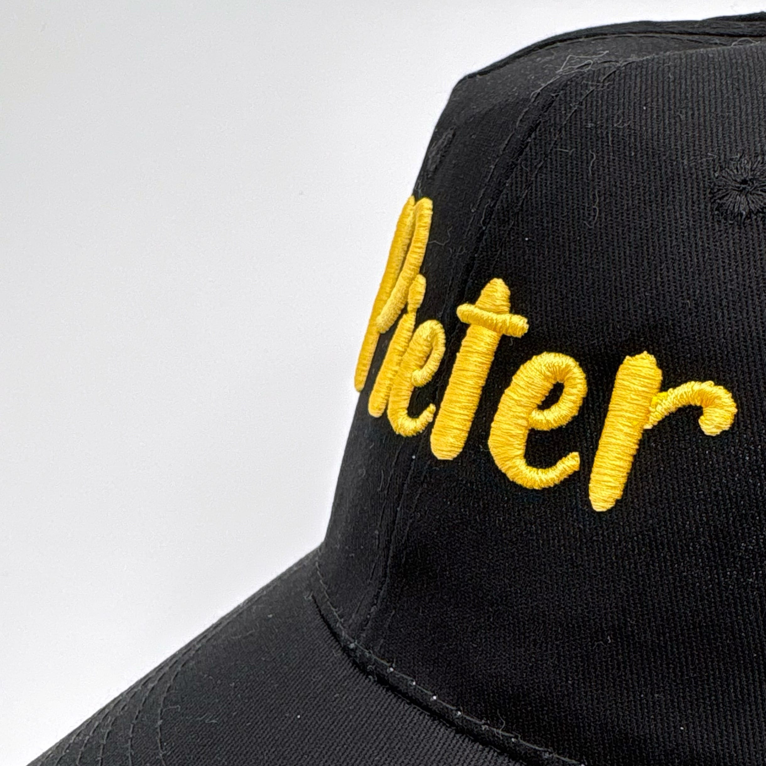 Pet met naam geborduurd