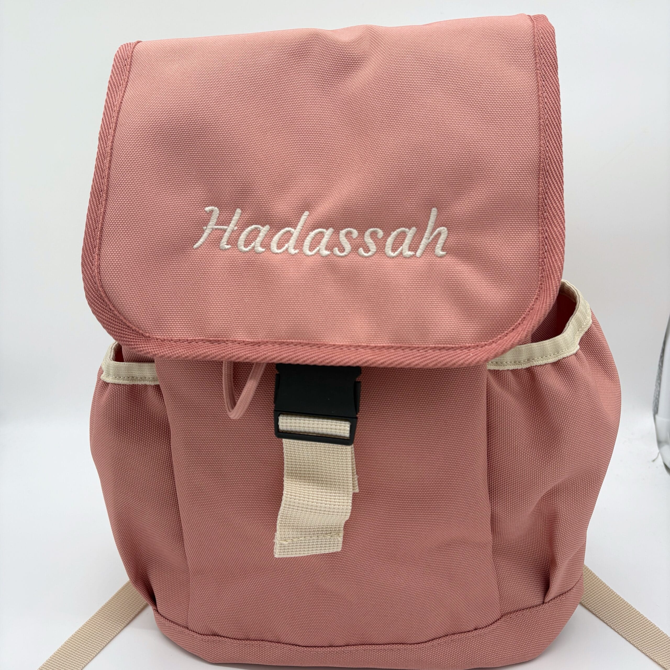 roze tas met naam geborduurd