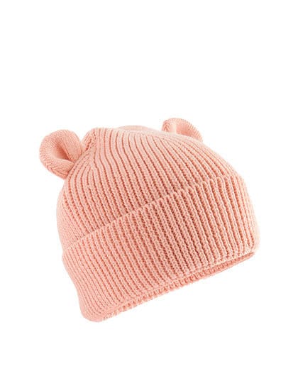 Baby muts in de kleur perzik met oortjes en naam geborduurd.