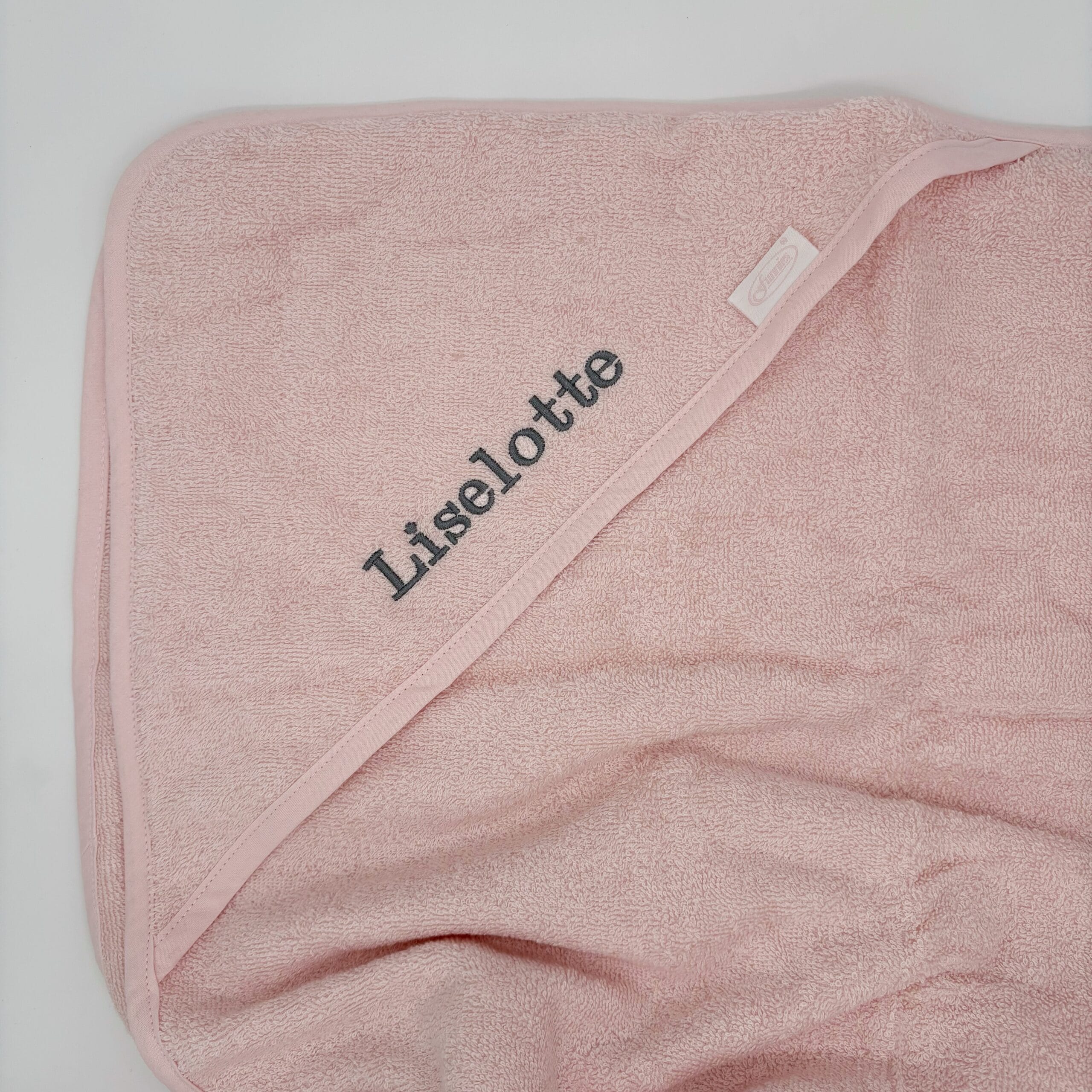 badcape met naam roze.